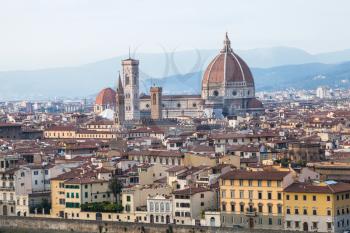 travel to Italy - above view old town and Duomo in Florence city from Piazzale Michelangelo in autumn evening