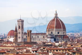 travel to Italy - above view of Duomo Cathedral in Florence city from Piazzale Michelangelo in autumn evening