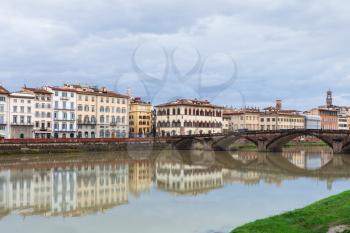 travel to Italy - view of Ponte alla Carraia over Arno river Florence city in autumn rainy day