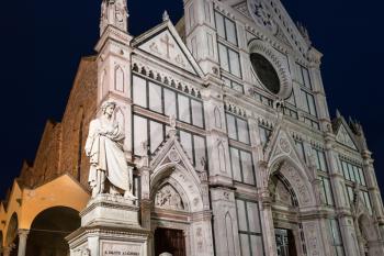 travel to Italy - statue of Dante Alighieri and Basilica di Santa Croce (Basilica of the Holy Cross) in Florence city in night