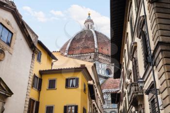 travel to Italy - dome of Cathedral Santa Maria del Fiore over houses in Florence city