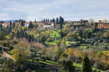 travel to Italy - above view of green gardens in suburb of Florence city from Piazzale Michelangelo in Florence city in autumn