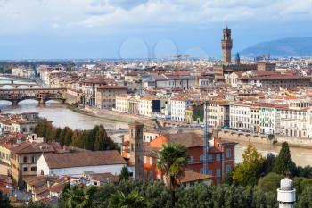 travel to Italy - skyline of Florence town with Ponte Vecchio and Palazzo Vecchio from Piazzale Michelangelo