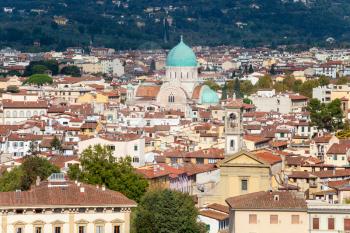 travel to Italy - view of Florence city with Great Synagogue (Tempio Maggiore) from Piazzale Michelangelo in autumn evening