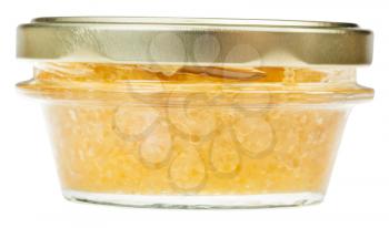 side view of closed glass jar with yellow caviar of pike fish isolated on white background