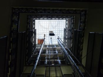 lift shaft in old multistory house in Rome