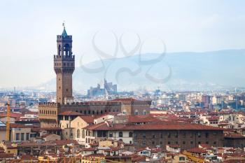 travel to Italy - above view of Old Palace in Florence city from Piazzale Michelangelo in autumn evening