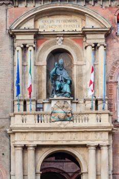 travel to Italy - statue of the Bolognese Pope Gregory XIII on facade of palazzo d'accursio (town hall) in Bologna city