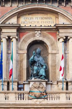 travel to Italy - figure of the Bolognese Pope Gregory XIII on facade of palazzo d'accursio (town hall) in Bologna city