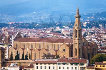 travel to Italy - above view of Basilica di Santa Croce in Florence city from Piazzale Michelangelo in autumn evening