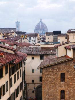 travel to Italy - above view of old houses in Florence town in rain