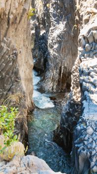 travel to Italy - water flow in Gole dell Alcantara (Gorge of Alcantara river) in Sicily