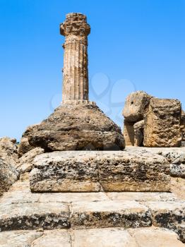 travel to Italy - Dorian column of ancient Temple of Heracles in Valley of the Temples in Agrigento, Sicily