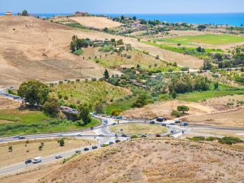 travel to Italy - roads and agrarian fields near Agrigento town on coast of Mediterranean sea in Sicily