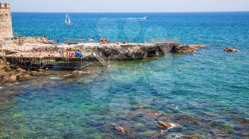travel to Italy - urban beach in Syracuse city in Sicily in summer day