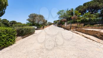 AGRIGENTO, ITALY - JUNE 29, 2011: way from park entrance to Valley of the Temples in Sicily. This area has largest and best-preserved ancient Greek buildings outside of Greece itself