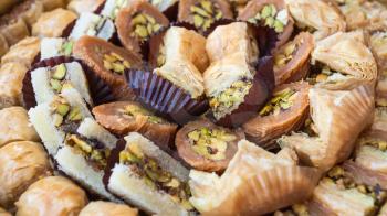 Travel to Middle East country Kingdom of Jordan - traditional arabian sweet pastry baklava close up