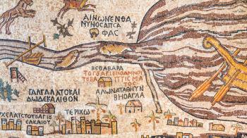 DEAD SEA, JORDAN - FEBRUARY 19, 2012: Modern replica of historical Madaba map. Madaba Mosaic Map is part of floor mosaic in ancient Byzantine church of Saint George, it dates to the 6th century AD