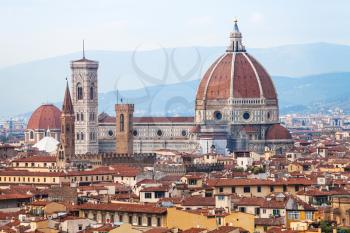 travel to Italy - above view of Duomo Cathedral in Florence town from Piazzale Michelangelo in autumn evening