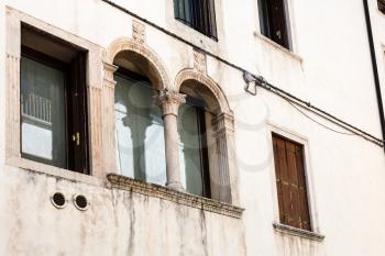 travel to Italy - wall of medieval palazzo on street Contra Giacomo Zanella in Vicenza city in spring.