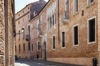 travel to Italy - medieval palazzo thiene on street contra porti in Vicenza city in spring.