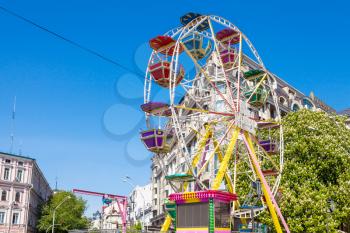 KIEV, UKRAINE - MAY 5, 2017: little amusement park on St Michael's (Mykhailivska ) Square in Kiev city. Mikhailovskaya is one of the oldest square in Kiev, it was formed in the XII century