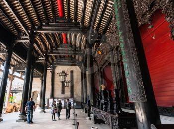 GUANGZHOU, CHINA - APRIL 1, 2017: people in patio of Chen Clan Ancestral Hall academic temple (Guangdong Folk Art Museum) in Guangzhou. The house was prepared for the imperial examinations in 1894