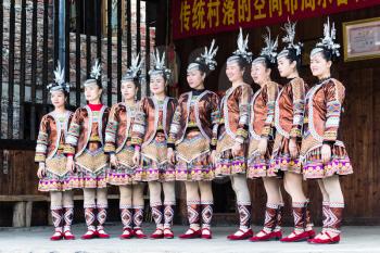 CHENGYANG, CHINA - MARCH 27, 2017: singers in Culture Show on square of Folk Custom Centre of Chengyang village of Sanjiang County in spring. Chengyang includes eight villages of the Dong people