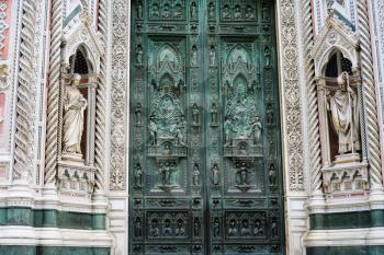 travel to Italy - closed doors of Santa Maria del Fiore Duomo Cathedral in Florence city in winter day