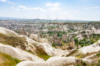 Travel to Turkey - view of mountain valley with Goreme town in Cappadocia in spring