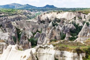 Travel to Turkey - old carved from rocks houses in Goreme National Park in Cappadocia in spring