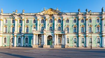facade of Winter Palace on Dvortsovaya Embankment in Saint Petersburg city in March evening