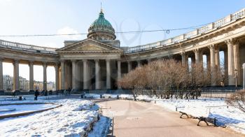 snow-covered garden near Kazan Cathedral in Saint Petersburg city in March morning