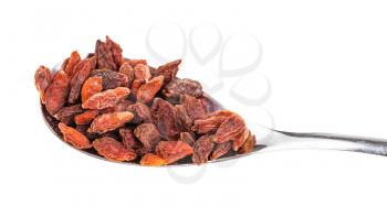 dried goji berries in spoon close-up isolated on white background