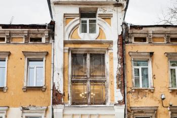 travel to Russia - shabby urban house of traditional Moscow architecture of the early 20th century on Chaplygin Street in Moscow city in winter