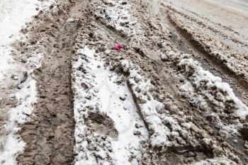 dirty snow on roadside after snowfall in Moscow city in winter