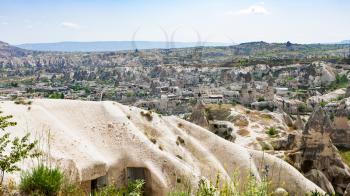 Travel to Turkey - above view of Goreme town from mountain in Cappadocia in spring