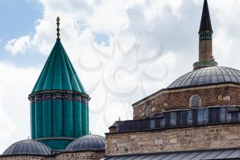 Travel to Turkey - green dome and roof of Mausoleum of Jalal ad-Din Muhammad Rumi (Mevlana) and Dervish Lodge (Tekke) of the muslim Mevlevi order in Konya city
