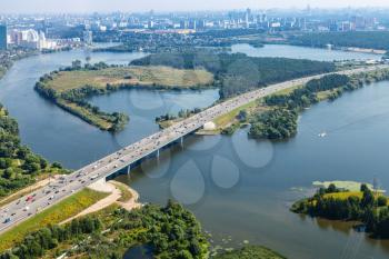 bird's-eye view of Novorizhskoye Shosse of Russian route M9 Baltic Highway over Moskva river in Pavshinsky Floodplain to Moscow city