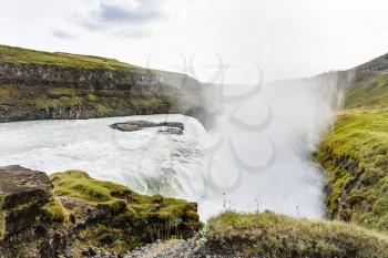 travel to Iceland - flow of Gullfoss waterfall in canyon of Olfusa river in september