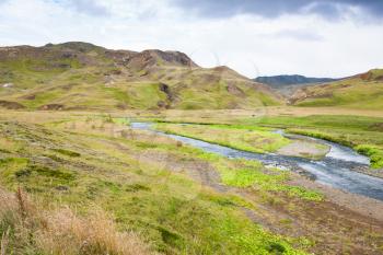 travel to Iceland - view of green valley with Varma river in Hveragerdi Hot Spring River Trail area in september