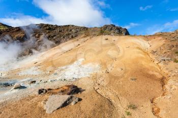 travel to Iceland - solfatara on yellow slope in geothermal Krysuvik area on Southern Peninsula (Reykjanesskagi, Reykjanes Peninsula) in september