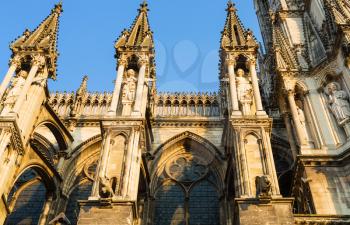 Travel to France - side view of Reims Cathedral (Notre-Dame de Reims) in summer evening from rue Robert de Coucy