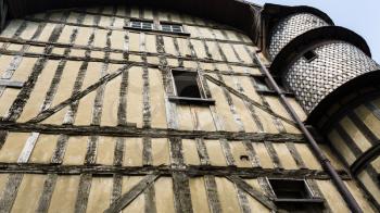 travel to France - old half-timbered house with tower on street Rue Champeaux in Troyes city