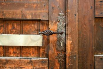 travel to France - old lock in old wooden door in Riquewihr town in Alsace