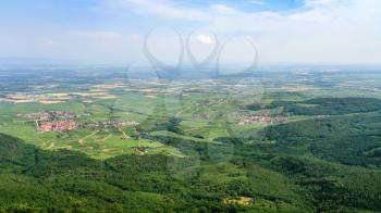 travel to France - above view of Saint-Hippolyte and Rodern villages in region Alsace Wine Route in Vosges Mountains valley from green Black Forest (Schwarzwald, Foret-Noire) Woodland