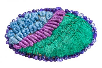 hand made knitted brooch isolated on white background