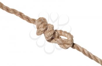 another side of stevedore knot tied on thick jute rope isolated on white background