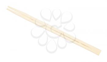 top view of pair of new disposable wooden chopsticks isolated on white background