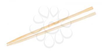 cheap disposable wooden chopsticks put together isolated on white background